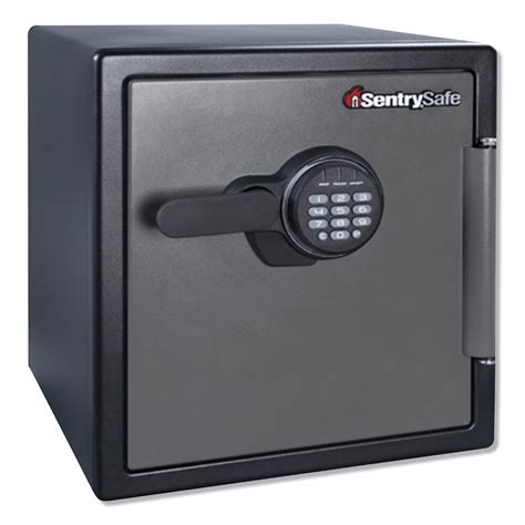  Insert a paper clip or pen point into the small hole in the cover. . Sentry safe no power to keypad